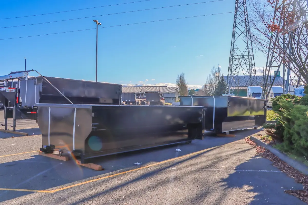 Roll-off dumpster ready for waste disposal at job site for Residential Dumpster Rental in Dundee